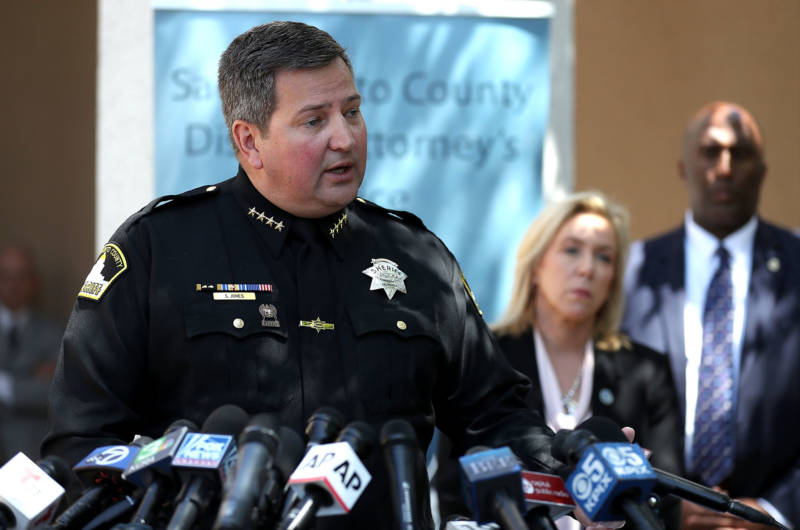 Sacramento County Sheriff Scott Jones speaks about the arrest of accused rapist and killer Joseph James DeAngelo during a news conference on April 25, 2018. District Attorney Anne Marie Schubert (Center) was joined by law enforcement officials from across California to announce DeAngelo's arrest.