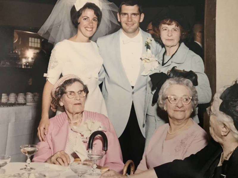 Inez Burns at a family wedding, standing third to left, 1966. 
