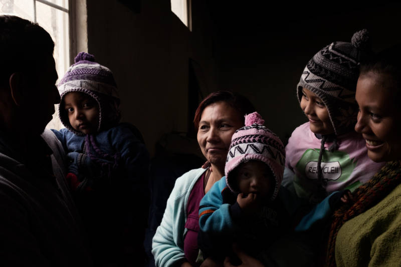 Víctor (from left), Steven, María, Sofía, Alison and Evelyn pose for a photo in a shelter in Tijuana before they turned themselves in at the San Ysidro Port of Entry, May 6, 2017.