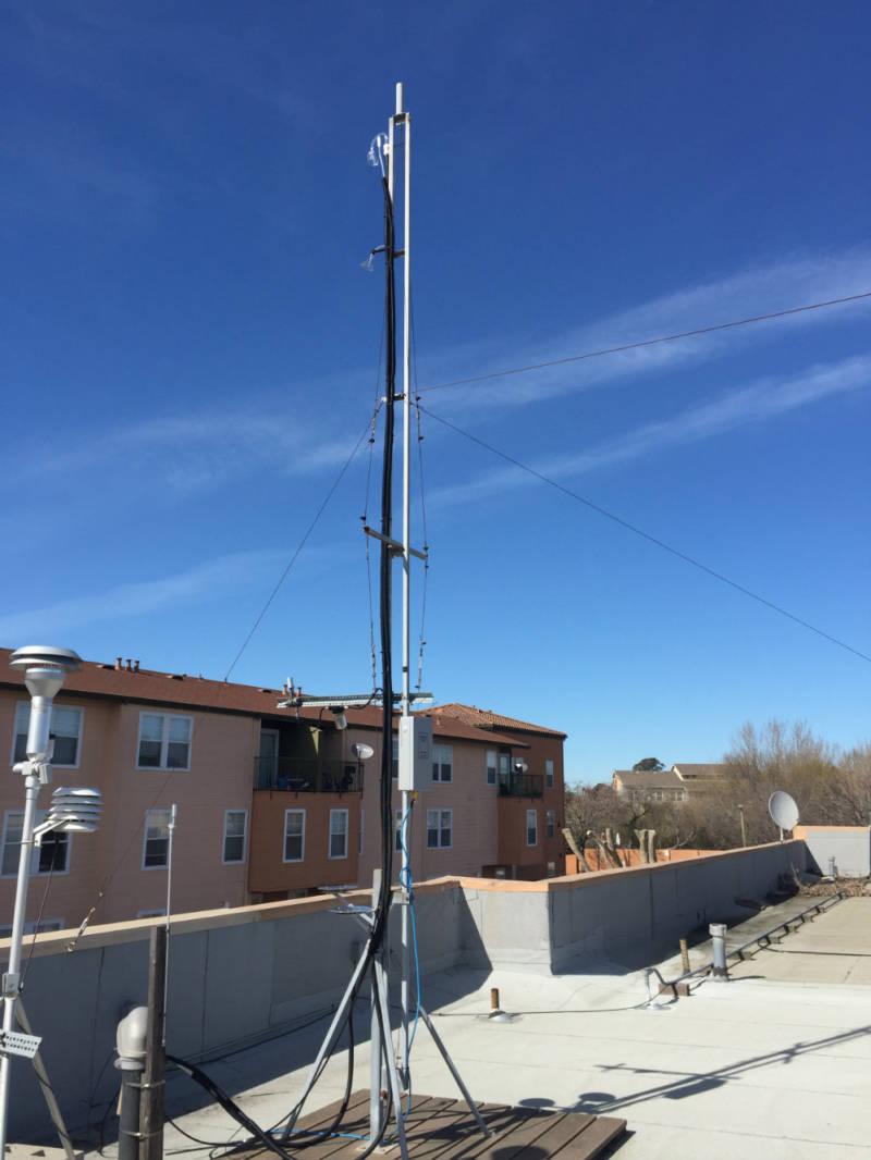 Air monitoring equipment set up on a roof.