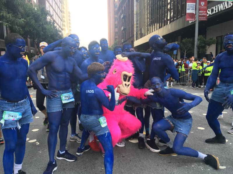 The iconic pink gorilla is seen again at this year's Bay to Breakers, surrounded by people dressed as an Arrested Development character.