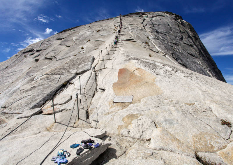 The infamous section of the Half Dome trail lined by support cables, pictured in good weather in 2012.