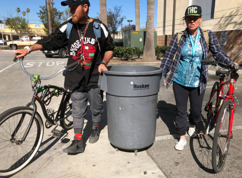 Robbin Nugent was asked to leave a Santa Monica shelter for not utilizing her bed enough, so she packed her belongings into a rolling trash can. Nugent is pregnant with twins.