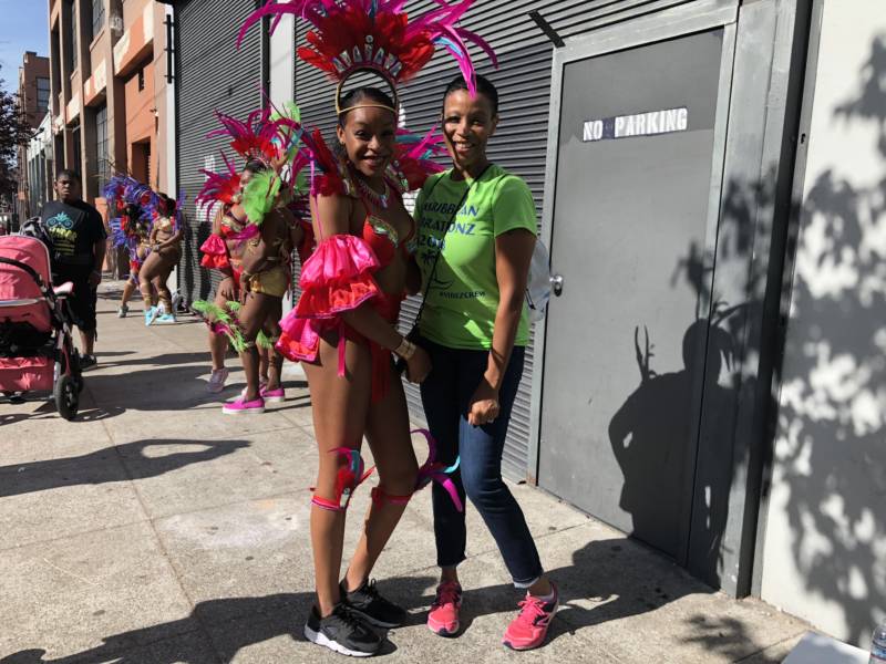 'I feel pretty pumped,' said Symone Watson (L), preparing for her first Carnaval parade with the dance group Caribbean Vibrationz.