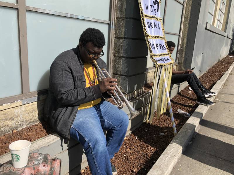 'I've been with these cats on and off,' David McKissich said of his group MJ's Brass Boppers Brass Band, while getting warmed up. 'When I heard about it I was like "I'll be there." '