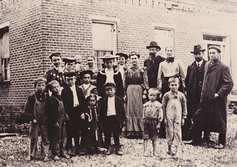 Members of the Nazarene Church stand in front of the John Rains House in Rancho Cucamonga, 1902.