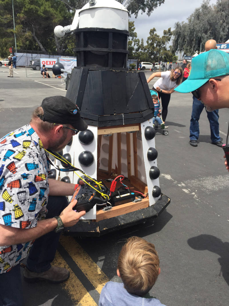 One of the makers shows 6-year-old Aiden Runquist of Santa Rosa his Dalek, a monster character from the television series 'Doctor Who.' The Dalek made noises at lit up leading Runquist to ask, 'Oh so when it gets mad it does that?'