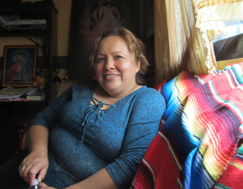 Maria Mendoza, 47, sits at her mother's house in Santa Monica, Hidalgo. Mendoza was deported to Mexico last summer after living in California for more than two decades.