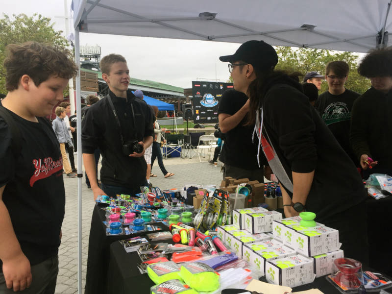 A vendor talks with a couple of yo-yo fans at the Bay Area Classic. Some of those in attendance came to get inspiration from the competitors in hopes of qualifying for the event next year.