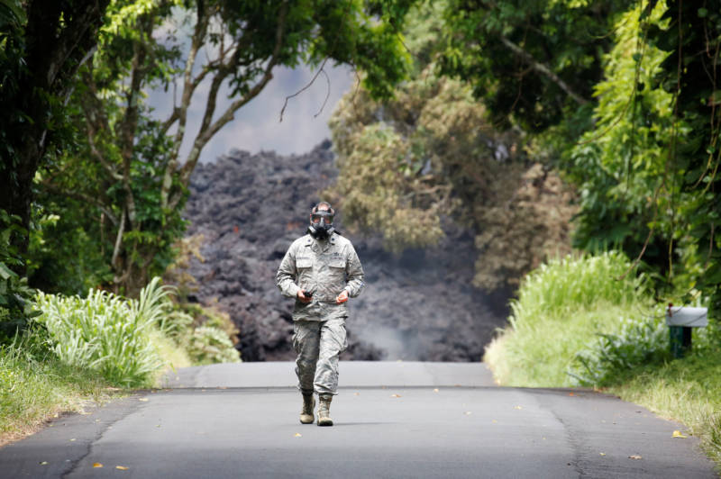 Lt. Col. Charles Anthony of the Hawaii National Guard measures sulfur dioxide gas levels at a lava flow on Highway 137 southeast of Pahoa.
