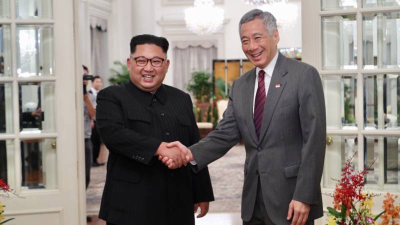 North Korea's Kim Jong Un meets Singaporean Prime Minister Lee Hsien Loong Sunday. Kim is scheduled to begin a summit Tuesday with President Trump.