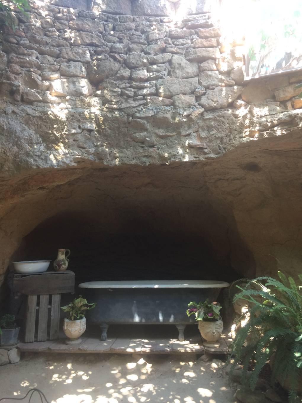 Forestiere's bathtub is underground and beneath huge skylights