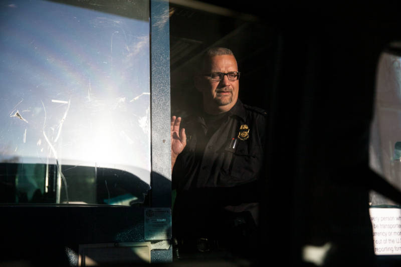Leaving Tecate as the sun rises on June 28, 2018, a U.S. Customs and Border Protection officer asks for passports.