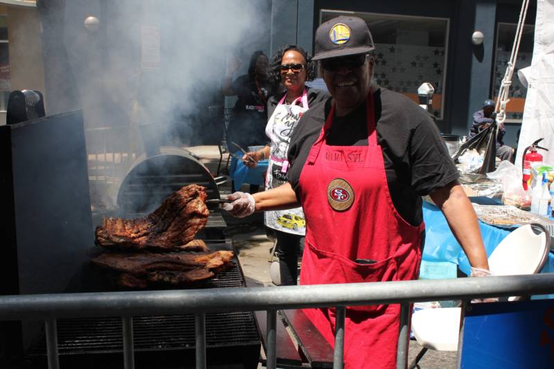 Sylvia Whitley at her hometown Juneteenth celebration in San Francisco. She lives in Richmond now but works in her cousin's construction and catering company, Yolanda's Construction/YoRays. Of the unusual combination, Whitley shrugs, "We can cook!"