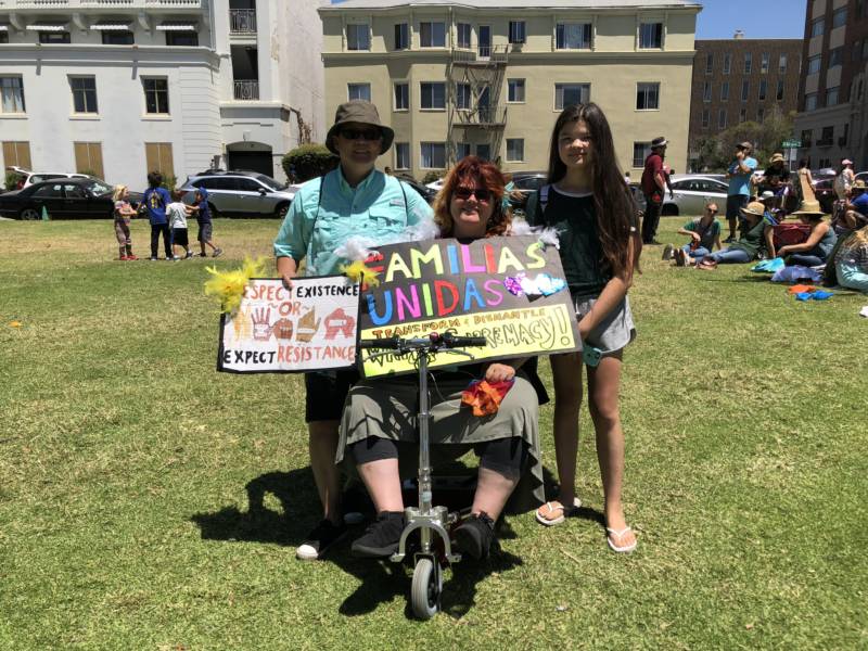 “I think it just sucks the way they’re separating families, especially children. I can’t even imagine if that happened to us and our daughter, it’d be the most devastating thing ever,' says Chino Scott-Chung (L) with his wife Maya Scott-Chung (C) and daughter Luna (R) at the rally in Oakland. 'My grandfather was Chinese and came to San Francisco and went to Mexico because of the Chinese Exclusion Act. My dad came to Angel Island in a boat as a young boy trying to escape war-torn China. His parents had to buy documents so he could come here, and our family lost our ancestral history. We lost that part of our names, our identity. And our Mexican part of the family can visit, but can never immigrate here.'