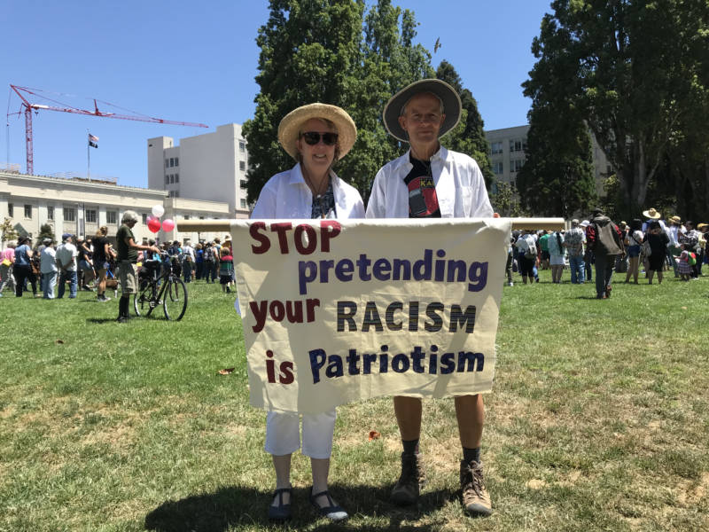 Carolyn Weil and Michael McDowell at the 'Families Belong Together' rally in Berkeley.