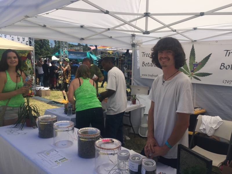 Jacob Richard works at the booth for his family's marijuana business that they run out of Humboldt County on June 2, 2018.
