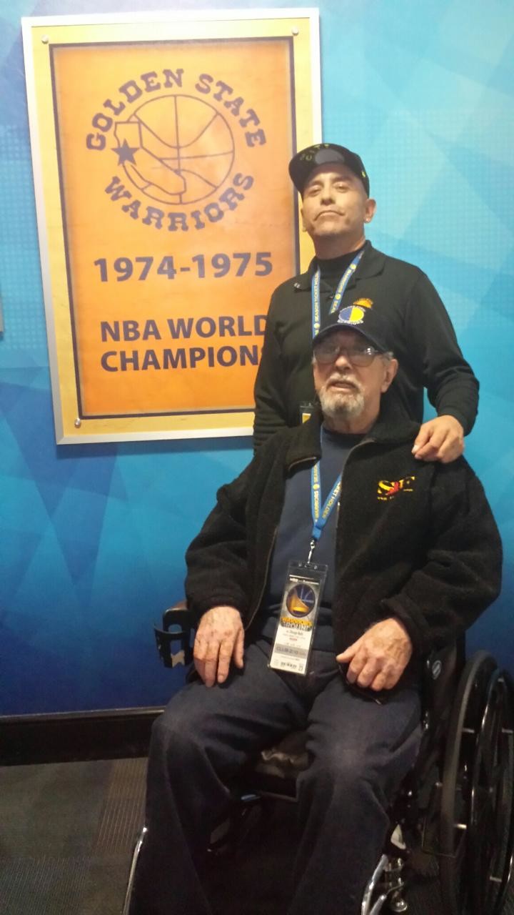 Mo Sanchez (standing) and his father Alfredo Sanchez Sr. at a Golden State Warriors game at Oracle Arena. Sanchez's father passed away two years ago from cancer. 'He'd be ecstatic,' Sanchez said if his father were still alive today. 'He'd be the most happiest man in the Bay Area.'