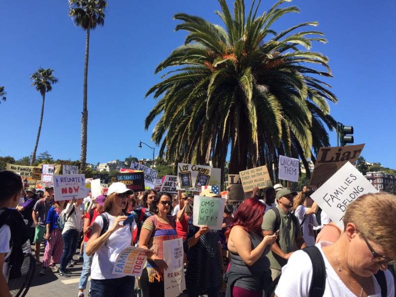 Demonstrators prepare to march from Dolores Park to San Francisco's Civic Center Plaza for the city's 'Families Belong Together' march.
