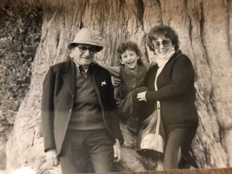 Sarah Stroe with her paternal grandparents, Mara and Angelo Stroe, in San Francisco's Golden Gate Park in the early 1990s.