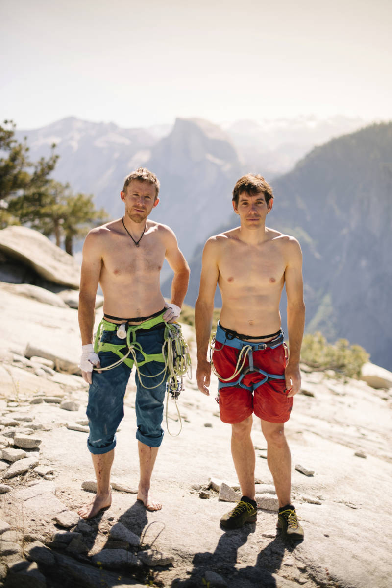 Tommy Caldwell and Alex Honnold pose for a portrait Sunday at the top of El Capitan in Yosemite National Park. Within days, the pair would go on to break their own record twice, including once in under 2 hours.