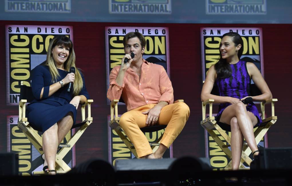 (L-R) Director Patty Jenkins, and actors Chris Pine and Gal Gadot participate in the Warner Bros. Theatrical Panel for 'Wonder 1984' during Comic Con in San Diego.