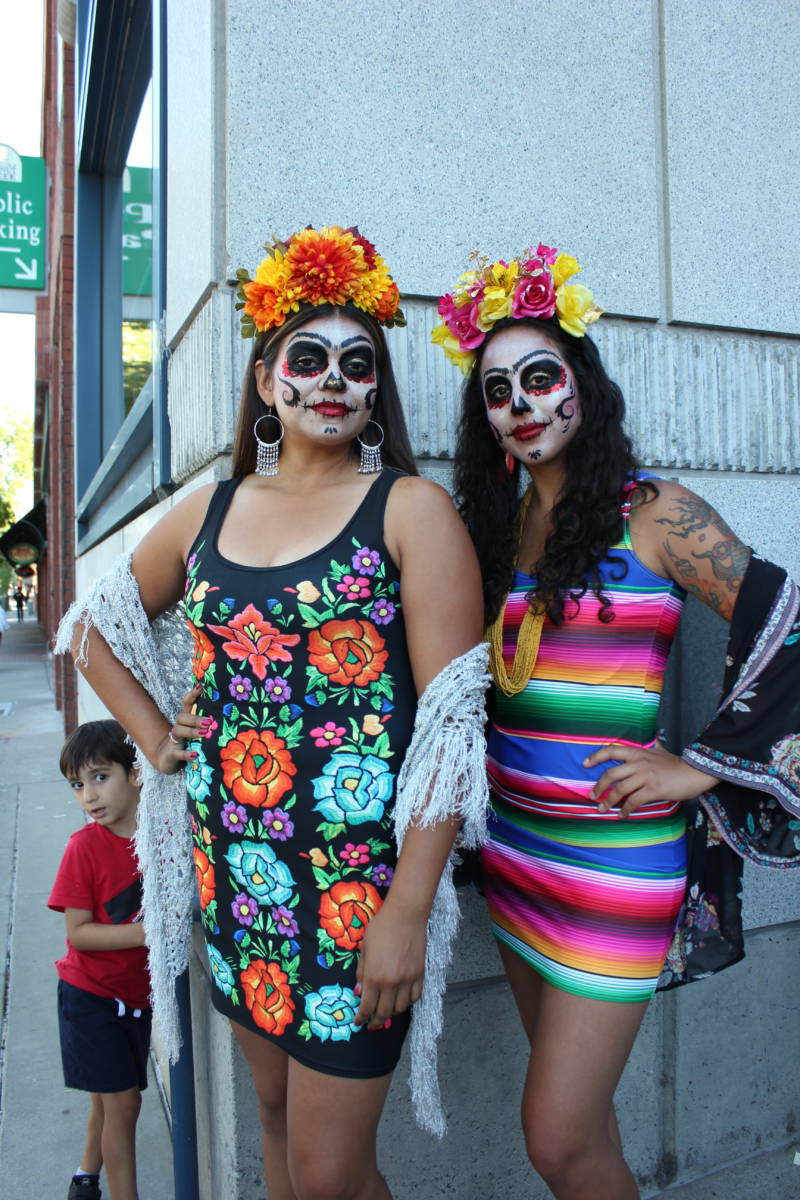 Vanessa Hernandez of Oakland and Gloria Magaña of Modesto prepare to walk in the Frida-inspired fashion show. Hernandez says Kahlo, to her, is "power."