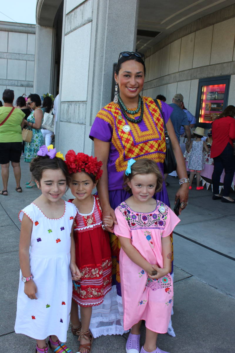 Rachel-Anne Palacios and from L to R: Azalia Cabrera (5), daughter Mayahuel Palacios (5) and Lucia Soriano (4) hang out at the Frida Kahlo celebration. The girls participated in an earlier Kahlo look-alike contest.