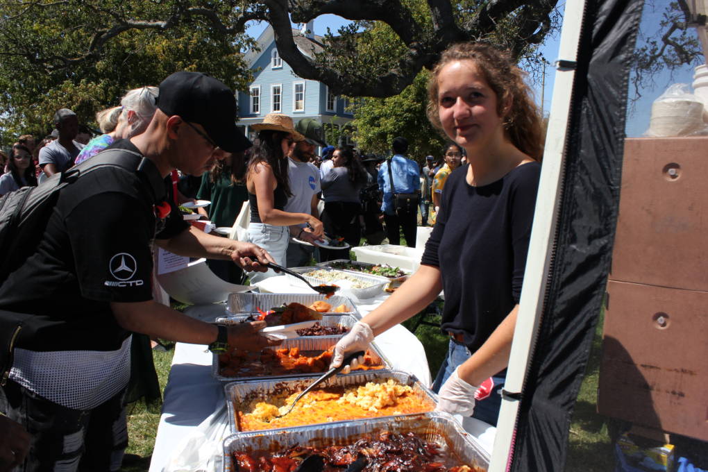 Zoe Oreopoulos asked to volunteer serving up ribs at the March for Our Lives event in Oakland while visiting from Germany.