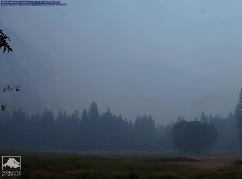 A view of Half Dome in Yosemite National Park just after noon on Sunday, July 15, 2018, with haze from the Ferguson Fire burning nearby.