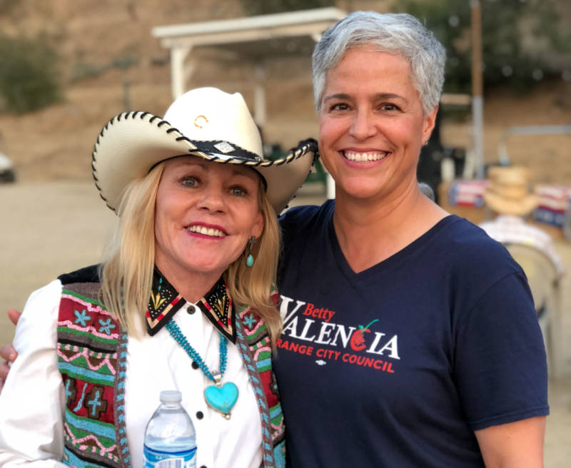 Betty Valencia (right) with a supporter in the city of Orange, California.