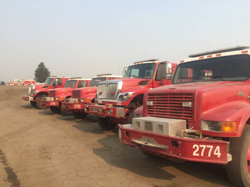 Redding Fire trucks at the incident command center for the Mendocino Complex in Ukiah.