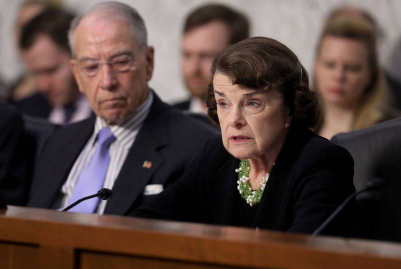 Senate Judiciary Committee ranking member Dianne Feinstein and Chairman Charles Grassley (R-IA) engage in a debate with fellow members of the committee during the third day of Supreme Court nominee Judge Brett Kavanaugh's confirmation hearing.
