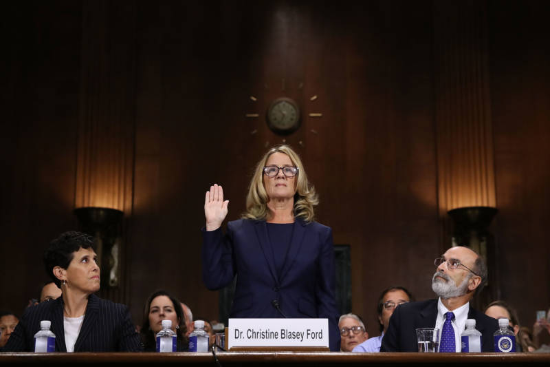 Christine Blasey Ford, the woman accusing Supreme Court nominee Brett Kavanaugh of sexually assaulting her at a party 36 years ago, is sworn in before the Senate Judiciary Committee confirmation hearing on Thursday.