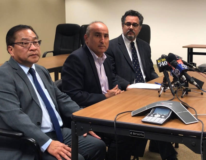 Tom Hui (L), director of San Francisco's Department of Building Inspection, Mark Zabaneh, executive director of the Transbay Joint Powers Authority, and Ron Alameida, director of project management for the city and county of San Francisco talk to reporters on Tuesday evening.