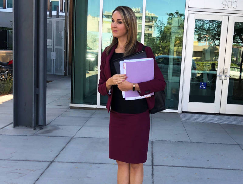 Deputy District Attorney Devon Bell speaks to reporters outside the Contra Costa County Courthouse shortly after a preliminary hearing in the case against dance coach Viktor Kabaniaev on Oct. 5, 2018.