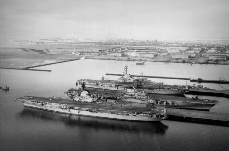 U.S. Navy aircraft carriers USS Hancock (CVA-19), USS Midway (CVA-41), and USS Bon Homme Richard (CVA-31) berthed at Naval Air Station Alameda in 1958.
