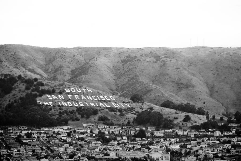 In 1977 the Suicide Club cut up refrigerator boxes and slid down the letters above South San Francisco.