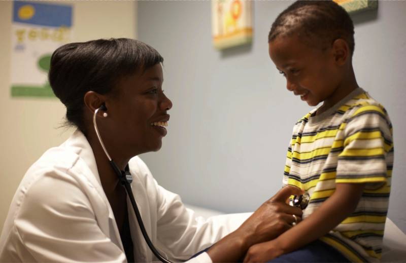 Dr. Nadine Burke Harris and a patient. 