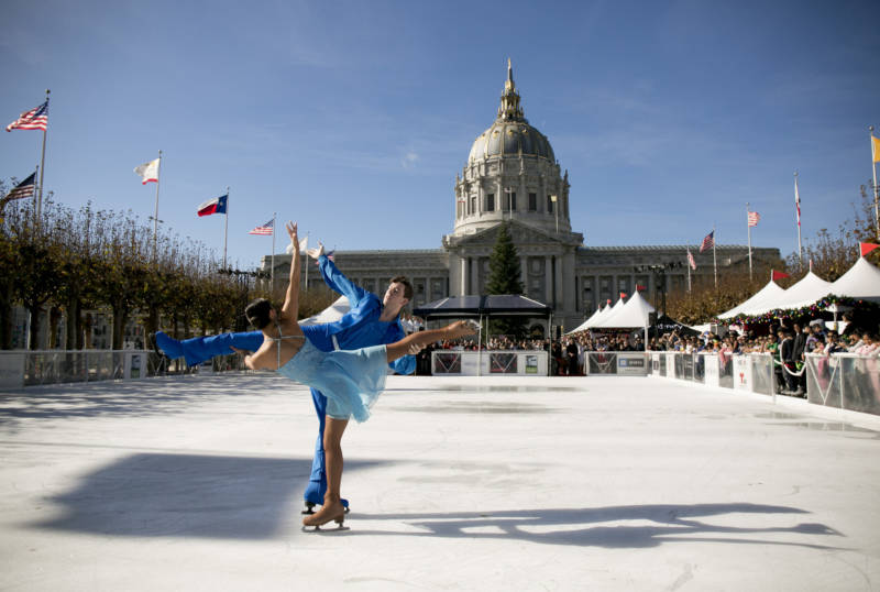 Figure skating team Cali Fujimoto and Nick Barsi-Rhyne perform a duet in front of City Hall on Nov. 30, 2018.