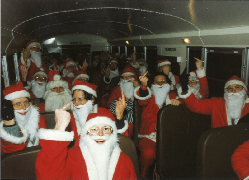 Rob Schmitt rented a bus for the Cheap Suit Santas to roam the streets of San Francisco.
