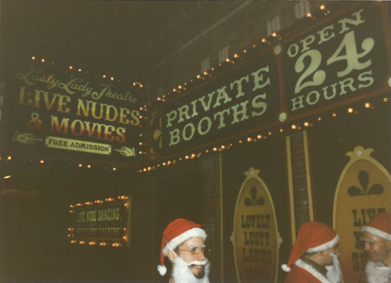 Santas headed into the Lusty Lady, a unionized strip club.