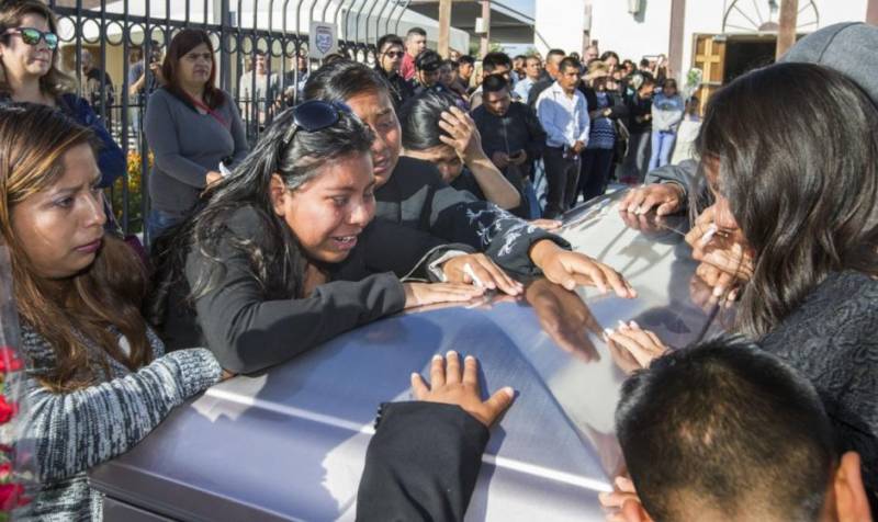 Mourning family bid goodbye to the immigrant couple who died fleeing ICE agents.