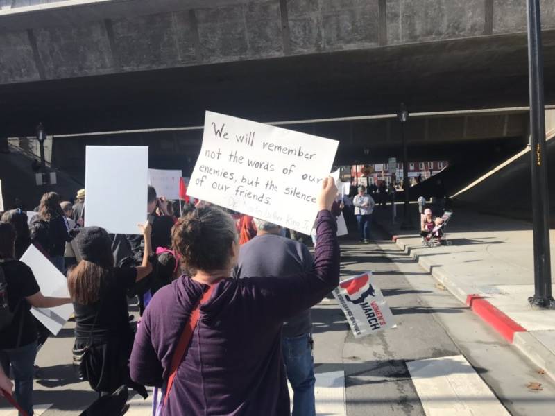 A marcher carries a sign with a Martin Luther King Jr. quote during the San Jose Women's March.
