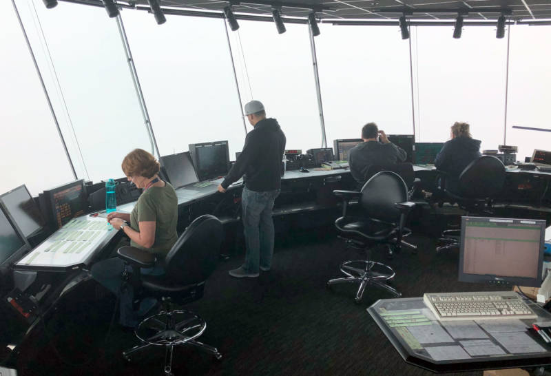 Air traffic controllers at work inside SFO's control tower.