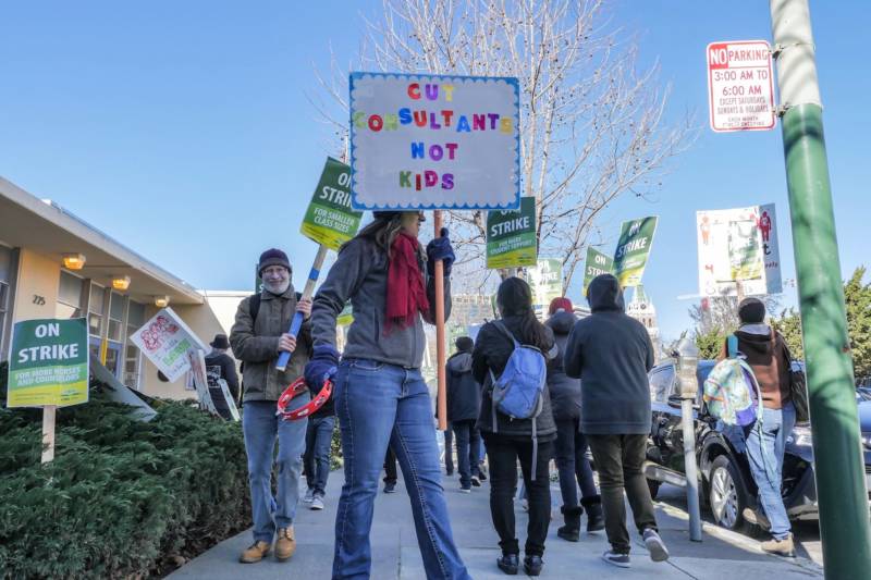 Striking teachers and supporters picket outside Lincoln Elementary School in Oakland on Feb. 21, 2019.