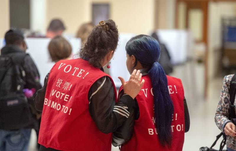 People vote at City Hall in San Francisco, California on November 6, 2018.