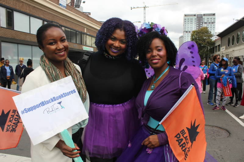 Miyishia Shay, Tiffany Andrews and Jamala Massenburg have a book club called "Booktini," which focuses on black female authors. Andrews says the parade is a fun time and reminds African-Americans that "we still exist! It would be nice if it were more than just once a year."