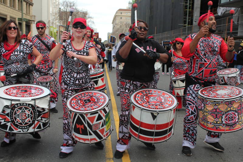 A drum group performs during the Black Joy Parade in downtown Oakland.
