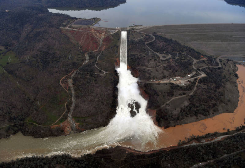Water cascades down the wrecked Oroville Dam spillway on February 13, 2017.
